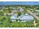 Aerial photo of house, shows lush landscaping with a private courtyard, conveniently located near local amenities and roadways at 329 W Grace St, Punta Gorda, FL 33950