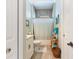 Bathroom features tile floor, shower-tub combo, and neutral paint at 329 W Grace St, Punta Gorda, FL 33950