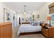 Bedroom featuring carpet floor, neutral paint, and a queen bed at 329 W Grace St, Punta Gorda, FL 33950