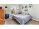 Bedroom featuring neutral paint, carpet floor, and windows with custom blinds at 329 W Grace St, Punta Gorda, FL 33950