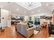 Spacious living room with hardwood floors open to kitchen; stylish furnishings; skylights at 329 W Grace St, Punta Gorda, FL 33950