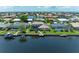 Waterfront home featuring a screened lanai, private dock, and stunning water views at 414 Caicos Dr, Punta Gorda, FL 33950