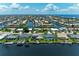 Picturesque aerial view of waterfront homes with private docks along winding canals, ideal for boating enthusiasts at 414 Caicos Dr, Punta Gorda, FL 33950