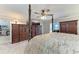 Bedroom featuring a four-poster bed, neutral walls, with carpeted floors at 414 Caicos Dr, Punta Gorda, FL 33950