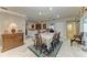 Inviting dining room with elegant furnishings and ample space for entertaining, perfect for hosting memorable gatherings at 414 Caicos Dr, Punta Gorda, FL 33950