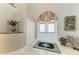 Inviting foyer with tiled flooring, closet, and decorative accents, creating a warm welcome at 414 Caicos Dr, Punta Gorda, FL 33950