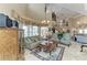 Spacious living room with a grand staircase and elegant furnishings at 414 Caicos Dr, Punta Gorda, FL 33950