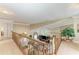 Open-concept living room with high ceilings and a beautiful view from the upper level at 414 Caicos Dr, Punta Gorda, FL 33950