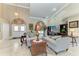 Spacious living room with high ceilings and large windows, creating a bright atmosphere at 414 Caicos Dr, Punta Gorda, FL 33950