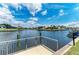 Scenic view of waterfront homes from a private dock, showcasing waterfront living at 414 Caicos Dr, Punta Gorda, FL 33950
