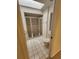 Bright bathroom featuring a walk-in shower, skylight, and neutral finishes at 4390 Wischamper St, Port Charlotte, FL 33948