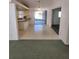 View of dining room adjacent to kitchen and sliding door to backyard at 4390 Wischamper St, Port Charlotte, FL 33948