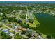 Aerial view showcasing the neighborhood's proximity to the water and the home's location on large lot at 501 Fairmont Ter, Port Charlotte, FL 33954