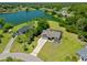 Aerial view highlighting the home's waterfront location, lush landscaping and neighborhood layout at 501 Fairmont Ter, Port Charlotte, FL 33954