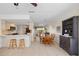 Open-concept kitchen and dining area with tiled floors and plenty of natural light at 69 Bunker Rd, Rotonda West, FL 33947