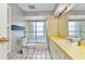 Bathroom showing a toilet, vanity, and combination shower and tub at 6916 Rex Ln, Sarasota, FL 34243