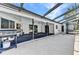 Large screened patio with outdoor gas grill and access to backyard pool at 6916 Rex Ln, Sarasota, FL 34243