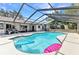 Screened-in pool area featuring a refreshing pool with patio, providing an excellent outdoor leisure space at 6916 Rex Ln, Sarasota, FL 34243