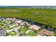 Beautiful waterfront homes with lush landscaping and private boat docks along the tranquil canal at 695 Macedonia Dr, Punta Gorda, FL 33950