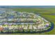 Beautiful neighborhood with waterfront homes, access to water, and lush landscaping and sidewalks at 695 Macedonia Dr, Punta Gorda, FL 33950