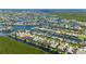 Waterfront homes nestled along canals and waterways are surrounded by lush tropical landscaping at 695 Macedonia Dr, Punta Gorda, FL 33950