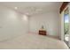 Bright bedroom features a ceiling fan and a sliding glass door leading to the outside at 695 Macedonia Dr, Punta Gorda, FL 33950