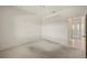 Spacious bedroom featuring carpet, a ceiling fan, and double door closet for ample storage at 695 Macedonia Dr, Punta Gorda, FL 33950
