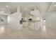 Open concept kitchen with a kitchen island, stainless steel appliances, and tile flooring at 695 Macedonia Dr, Punta Gorda, FL 33950