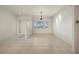 Bright living room with tile floors, white walls, and plenty of natural light at 695 Macedonia Dr, Punta Gorda, FL 33950