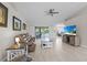 Bright living room with tile floors, neutral paint, and plenty of space for entertaining at 7448 S Blue Sage, Punta Gorda, FL 33955