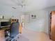 Bedroom featuring a ceiling fan and a work desk with a computer at 85 Long Meadow Ct, Rotonda West, FL 33947