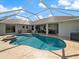 Large screened pool and spa with spacious deck, ideal for entertaining and relaxation at 85 Long Meadow Ct, Rotonda West, FL 33947