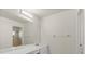 Bathroom featuring a vanity with bright modern fixtures and a large mirror at 118 Naomi Pl, Rotonda West, FL 33947