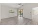 Bedroom featuring a sliding glass door to the pool deck at 118 Naomi Pl, Rotonda West, FL 33947