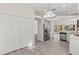 Spacious kitchen area with stainless steel refrigerator and easy access to outdoor living spaces at 118 Naomi Pl, Rotonda West, FL 33947