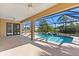 Inviting pool area featuring a screened-in lanai for year-round outdoor enjoyment at 118 Naomi Pl, Rotonda West, FL 33947