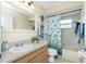 Well-maintained bathroom with a shower and tub combination and stylish decor at 12185 Weimar Ave, Port Charlotte, FL 33981