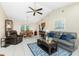 Cozy living room features a comfortable seating arrangement and inviting atmosphere at 12185 Weimar Ave, Port Charlotte, FL 33981