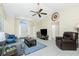 Comfortable living area with vaulted ceilings and tile floors perfect for relaxing at 12185 Weimar Ave, Port Charlotte, FL 33981