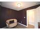 This bedroom with updated floors, modern paint and trim, featuring a loveseat at 13495 Newport Ave, Port Charlotte, FL 33981
