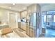 Modern kitchen with stainless steel appliances, granite countertops, and a door to a lanai at 13495 Newport Ave, Port Charlotte, FL 33981