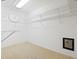 Walk-in closet featuring wire shelving and a built-in safe at 13783 Palmetto Point Ct, Port Charlotte, FL 33953