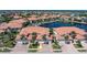 Community of well-maintained townhomes with lush landscaping and private docks, creating a luxurious waterfront living experience at 143 Tropicana Dr # 1012, Punta Gorda, FL 33950