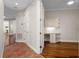 Bright bedroom with hardwood floors featuring built in desk and cabinets as well as neutral walls at 143 Tropicana Dr # 1012, Punta Gorda, FL 33950
