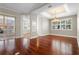 Elegant dining area with chandelier, tray ceiling, and sliding glass doors, perfect for entertaining at 143 Tropicana Dr # 1012, Punta Gorda, FL 33950