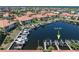 An aerial view of Dock #27, located in a canal lined with boats at 143 Tropicana Dr # 1012, Punta Gorda, FL 33950