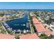 An aerial view of the community canal, showing a boat dock at 143 Tropicana Dr # 1012, Punta Gorda, FL 33950