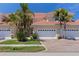 Charming townhome with paver driveway, two-car garage and well-manicured landscaping, creating a welcoming curb appeal at 143 Tropicana Dr # 1012, Punta Gorda, FL 33950