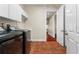 Laundry room with a washer, dryer, cabinets, and ceramic tile flooring at 143 Tropicana Dr # 1012, Punta Gorda, FL 33950