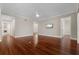 Open living room with gleaming hardwood floors, ceiling fan, recessed lighting, and neutral paint palette at 143 Tropicana Dr # 1012, Punta Gorda, FL 33950